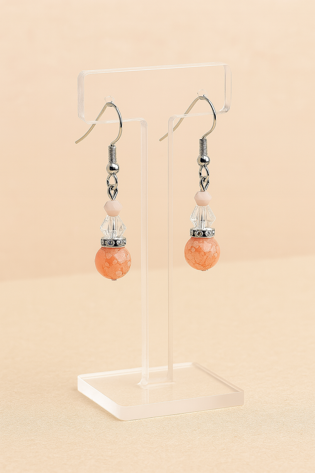 Handcrafted peach toned crystal dangle earrings