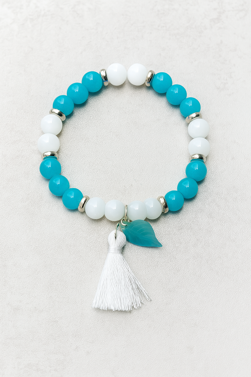Blue & White Beaded Stretch Bracelet with Tassel and Leaf Charm