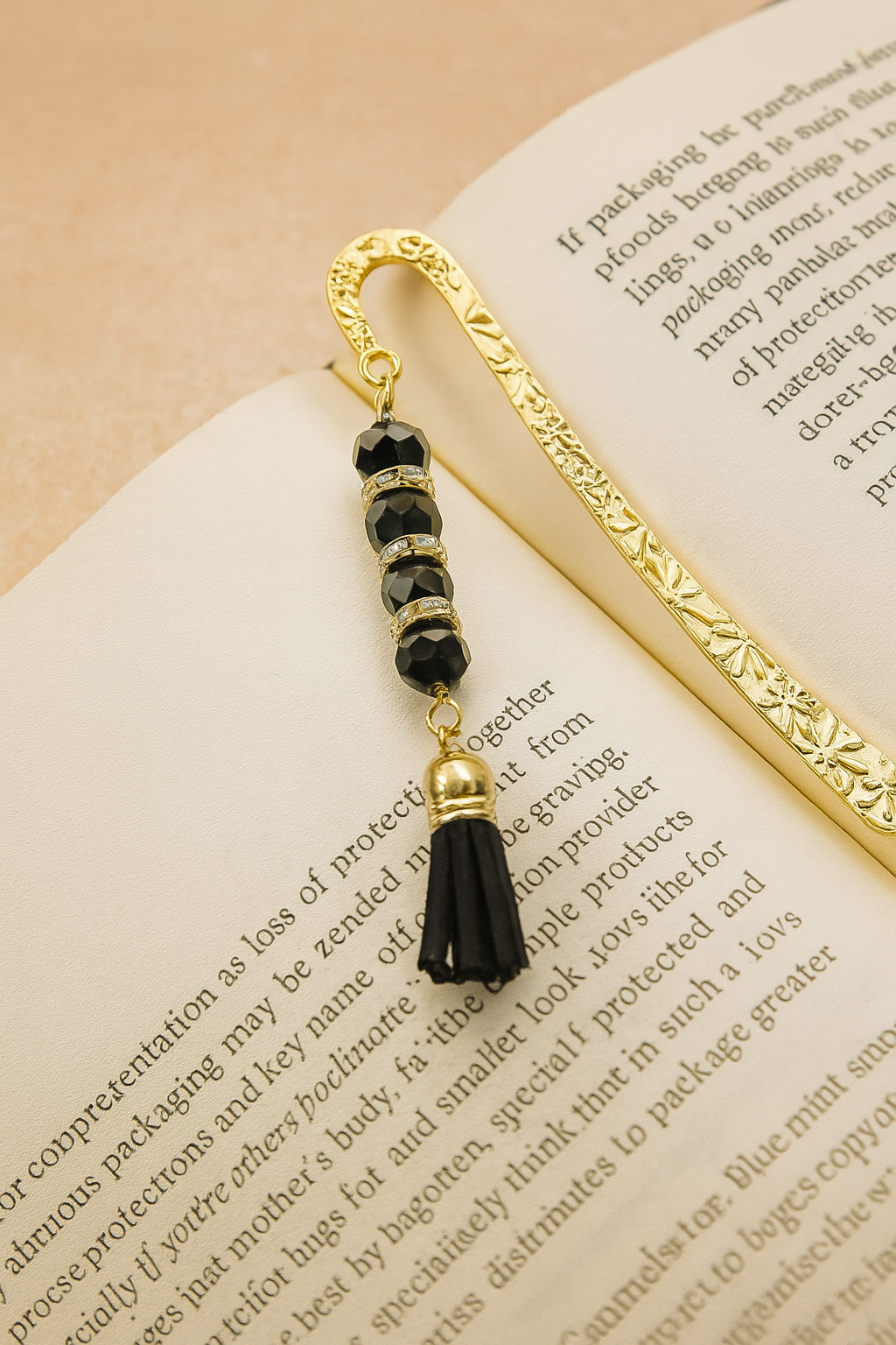 Elegant Golden Bookmark with Black Beaded Tassel