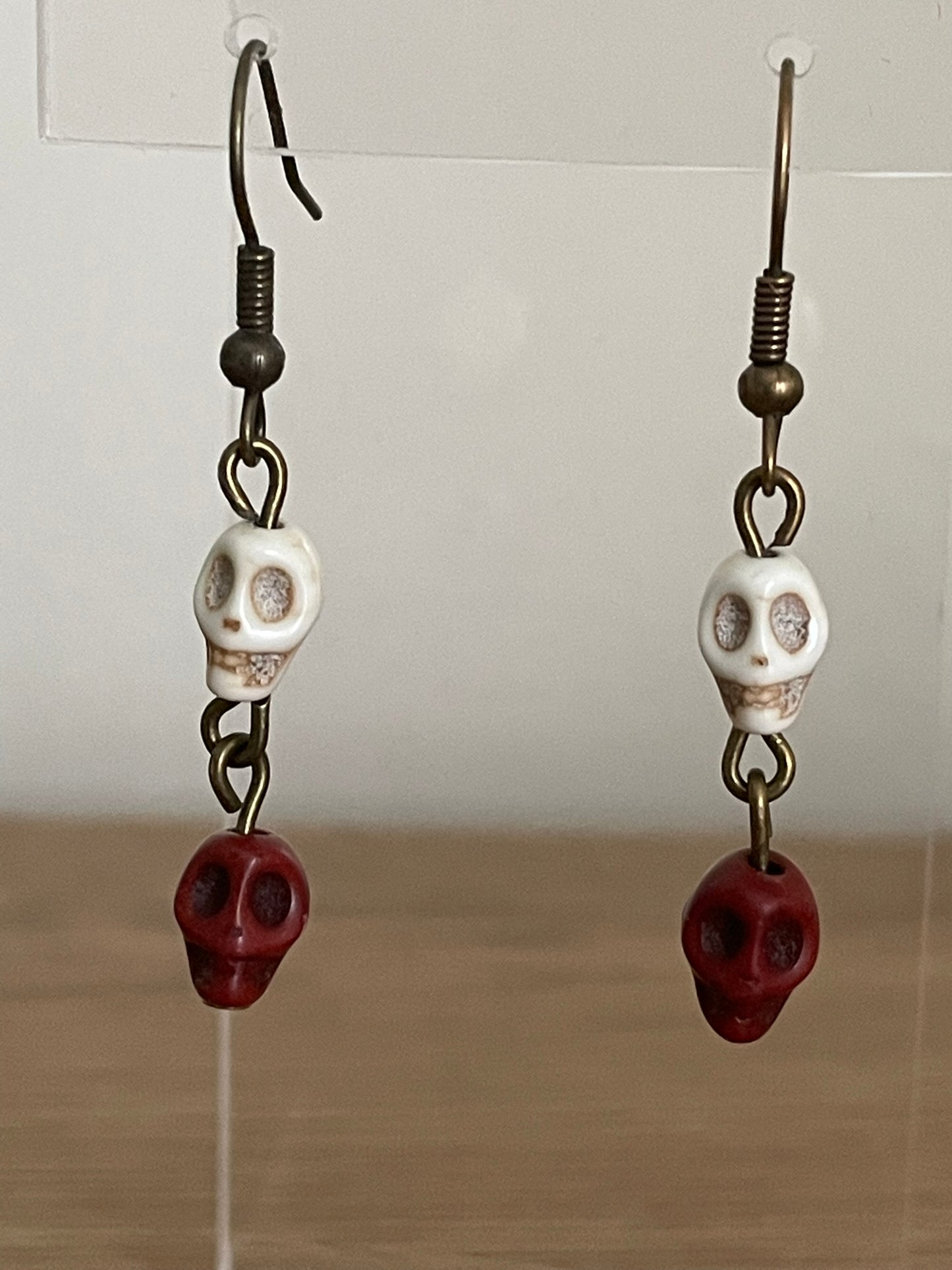 Double Skull Dangle Earrings